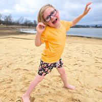 Boy in yellow rash guard