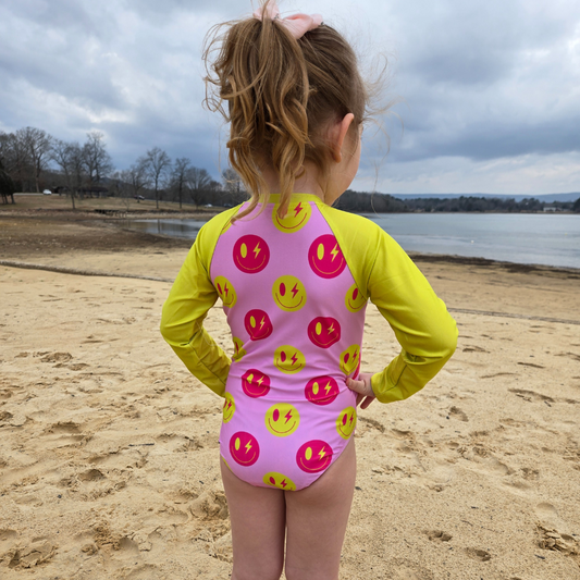 Girl in Smiley swimsuit