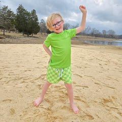 Boys short sleeve rash guard set green checker pattern - front view