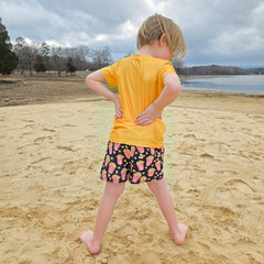 High visibility neon boys swimwear popcorn print rear view