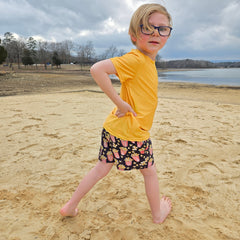 High visibility neon boys swimwear popcorn print rear view